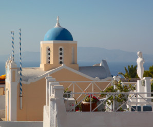 Blue domed church in Oia Santorini Greece