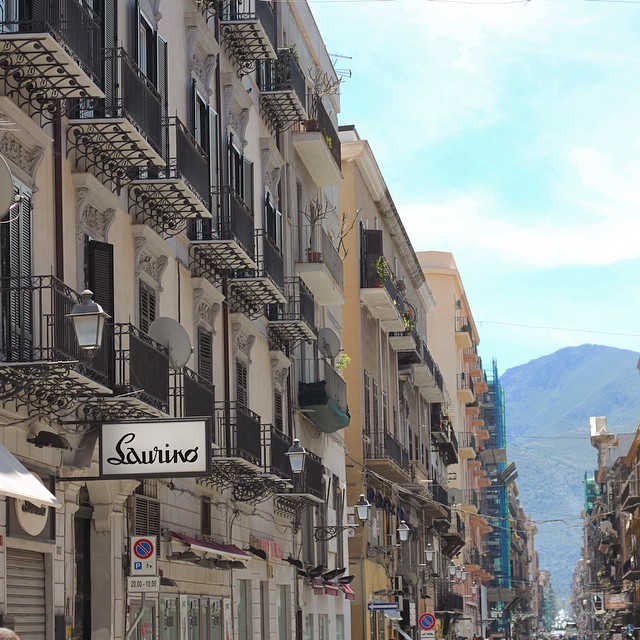It was while walking down Via Maqueda this morning that I officially fell for Palermo. I finally don't feel jetlagged, the sun is shining, and there's a view of both balconies AND mountains!
